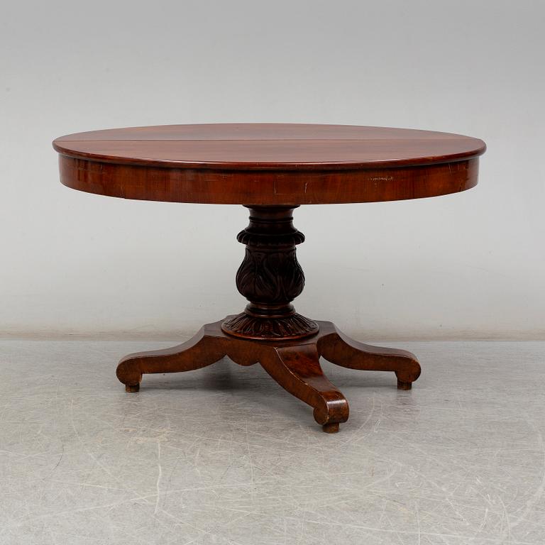 A late Empire Dinner table, 19th century.