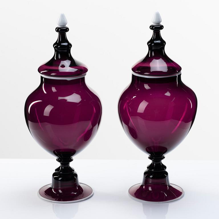 A pair of purple glass jars with covers, presumably Norway, 19th Century.