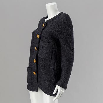 A jacket by Chanel.