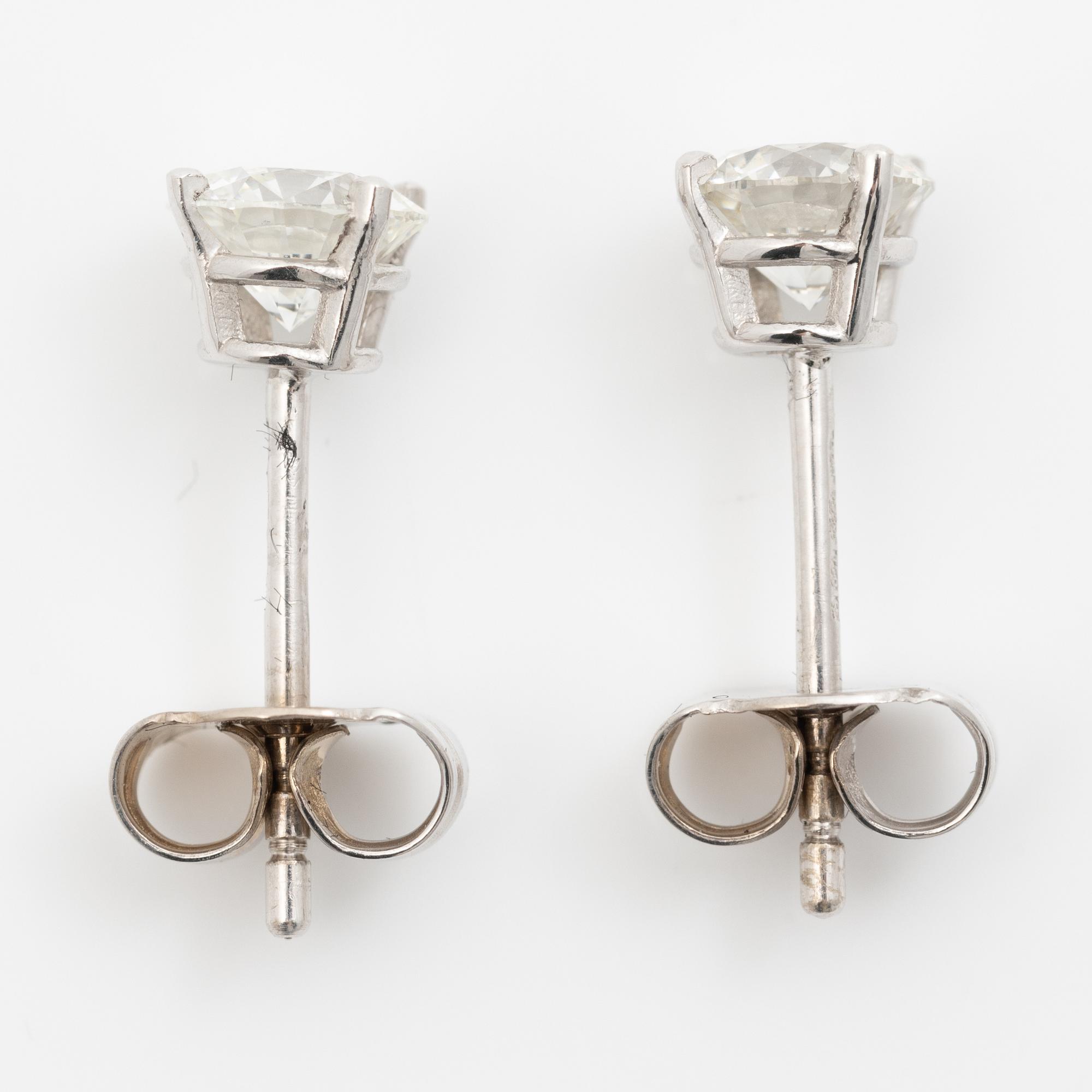Earrings, a pair, 18K white gold set with round brilliant-cut diamonds totalling 1.03 ct, accompanied by a GIA dossier.