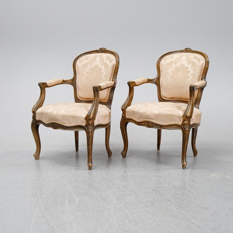A pair of Louis XV-style arm chairs, 20th century.