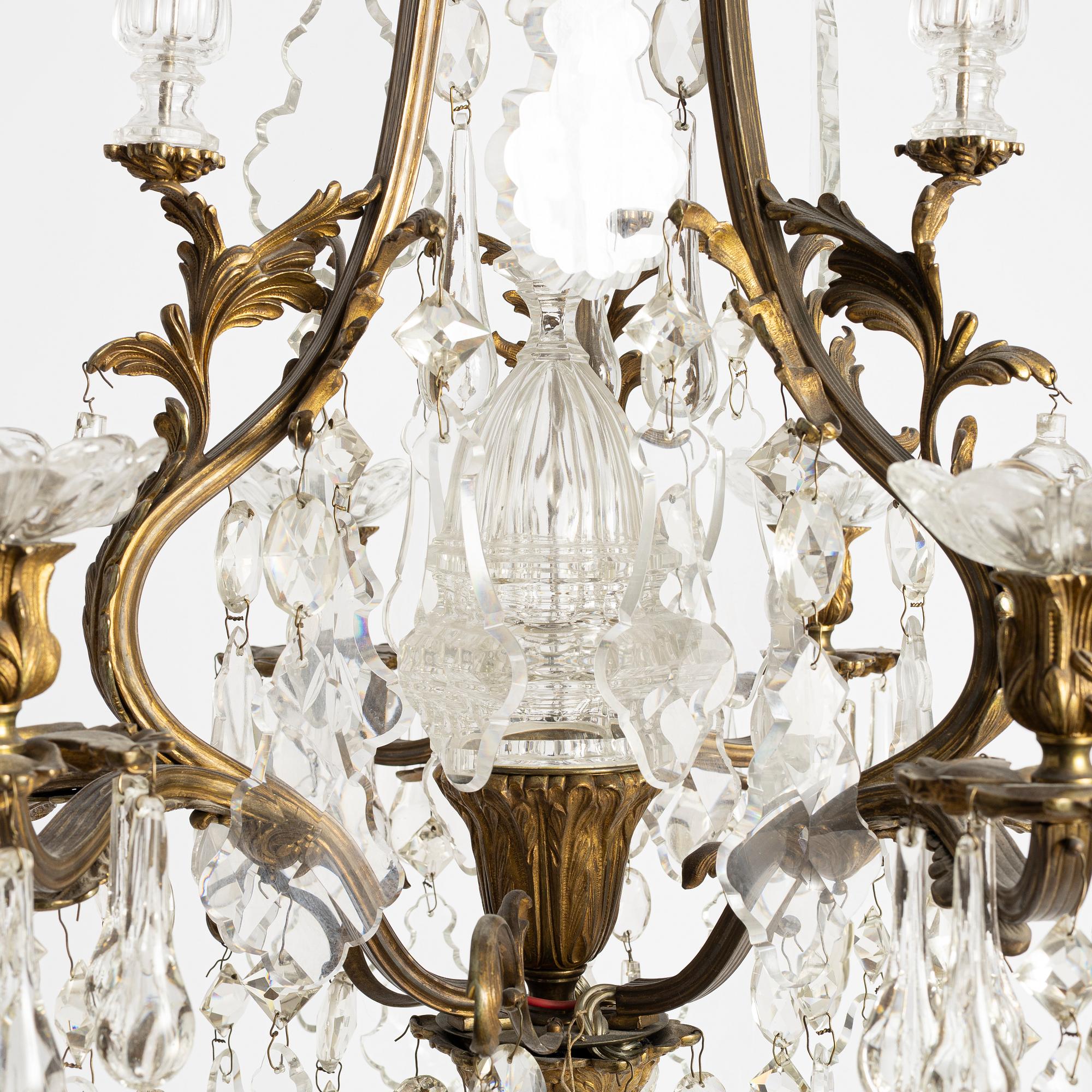 A six-branch rococ-style chandelier, first part 20th century.