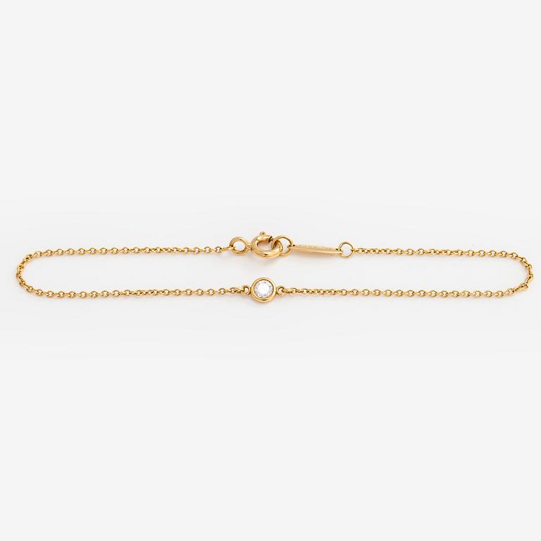 Tiffany & Co, Elsa Peretti, an 18K gold bracelet, 'Diamonds by the Yard', with a diamond approximately 0.08 ct.