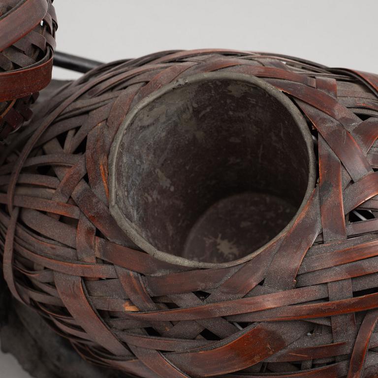 A double gourd shaped Hanakag 'Ikebana' bamboo basket for flower arrangement with stand, first half of the 20th century.