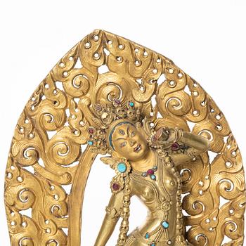 Dakini, förgylld kopparlegering. Sarvabuddhadakini, Tibet, 1800-tal.