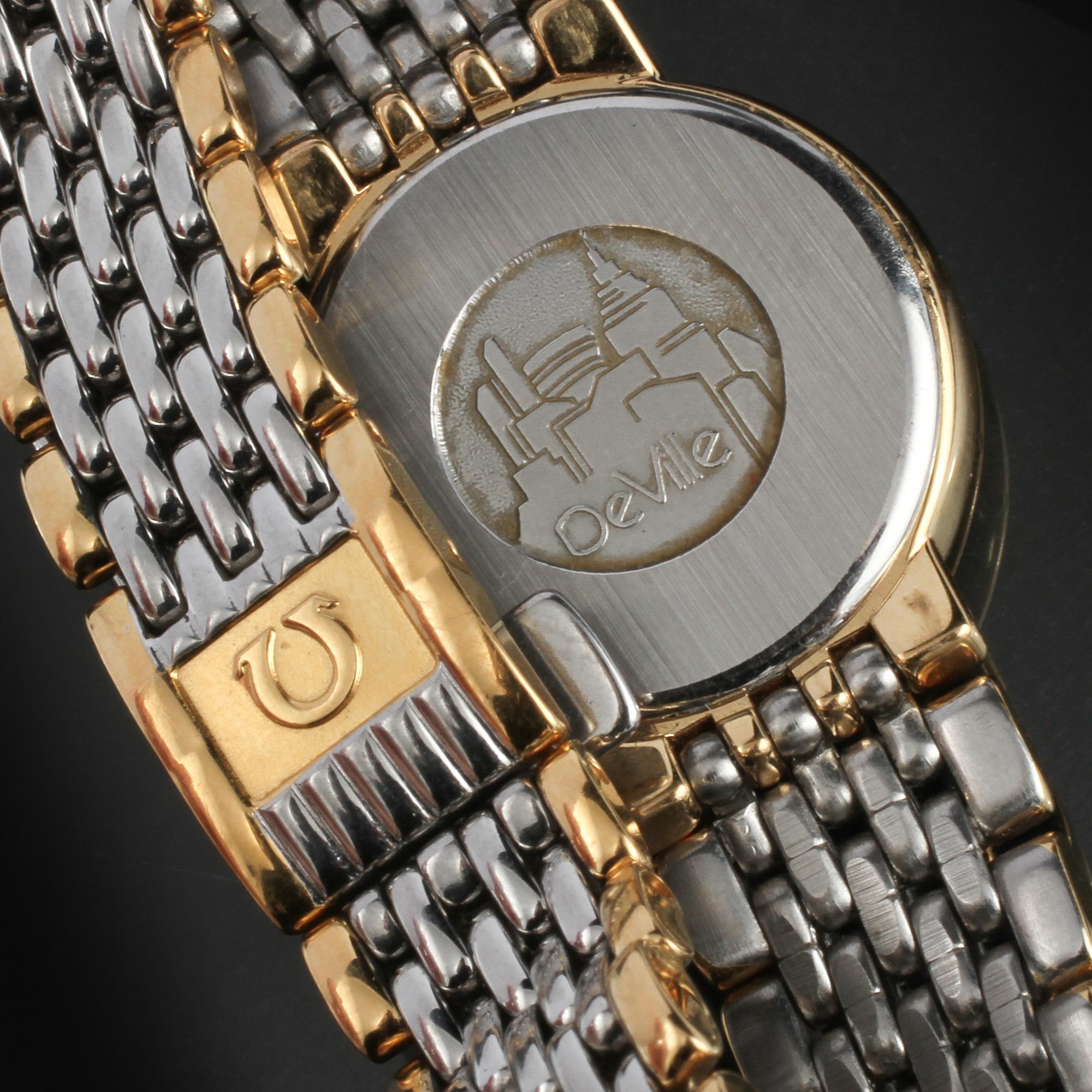 DAMARMBANDSUR, stål samt guld på stål, "De Ville", Omega, 1900-talets senare del.