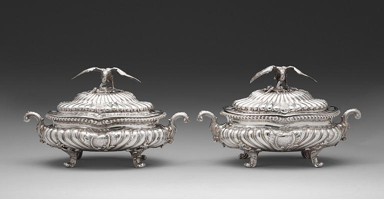 A pair of English mid 18th century silver tureens, marks of Frederick Kandler, London 1755.