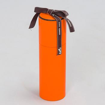 Hermès, a 'Collier de Chiens Maxi Twilly' silk scarf.