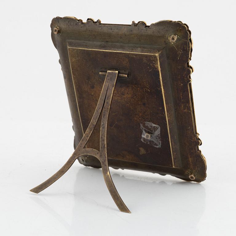 A late Empire ormolu frame with an officer's portrait, 1830's/40's.