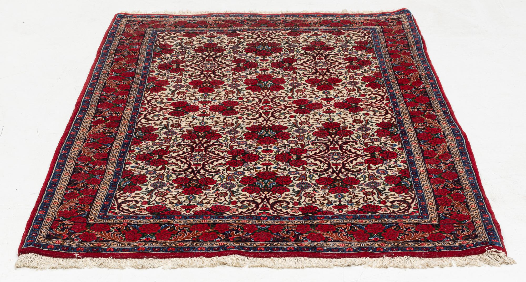 A rug, Ghom, circa 206 x 136 cm.