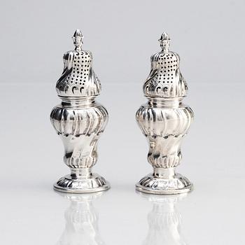 A pair of Swedish 18th century silver rococo salt and peppershakers, Eksjö  1761.