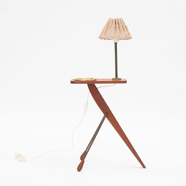 A floor lamp with table, 1950's.