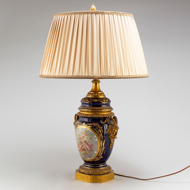 A French bronze mounted porcelain table lamp, late 19th Century, signed Thuilier.