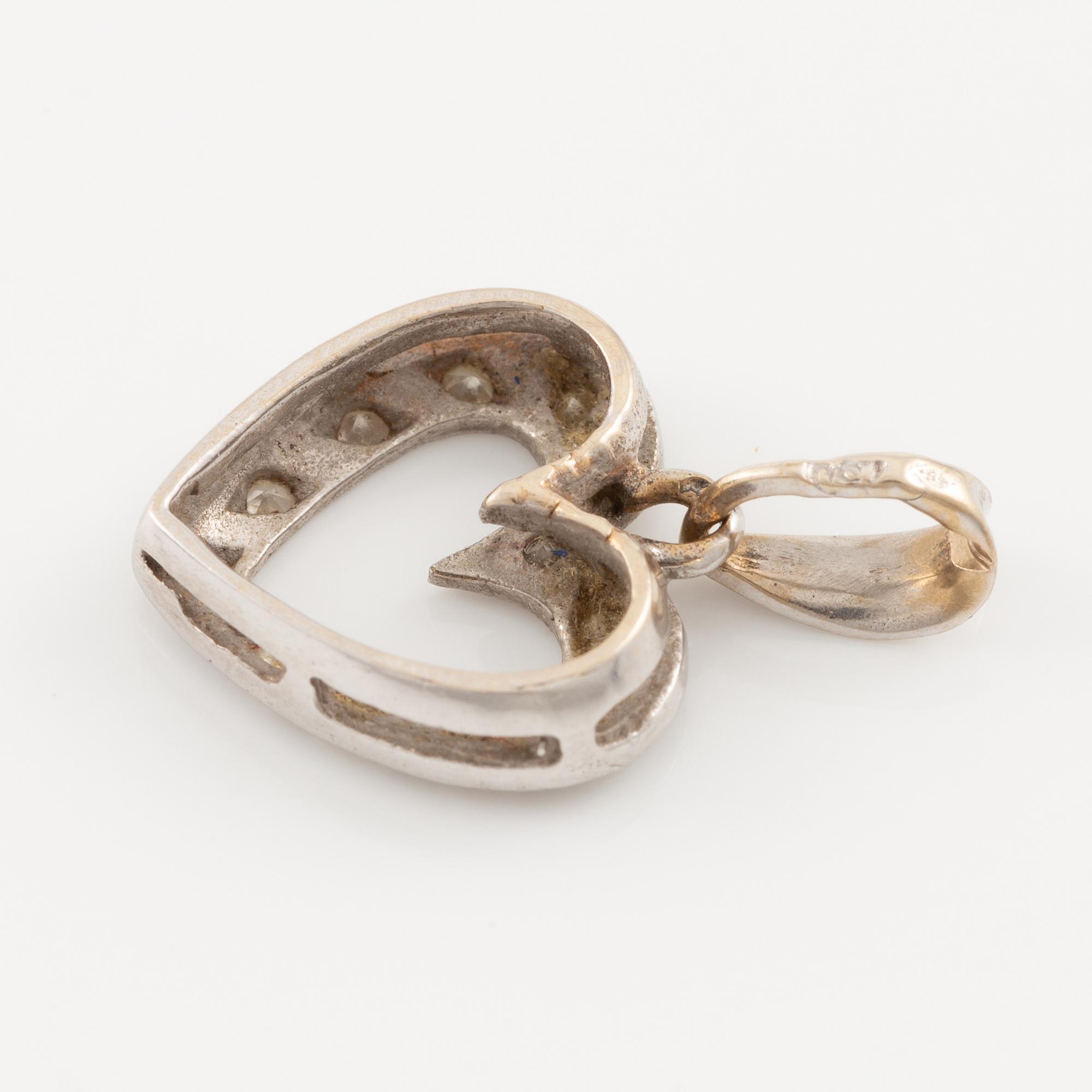 Pendant, in the shape of a heart, 18K white gold with octagonal-cut diamonds.