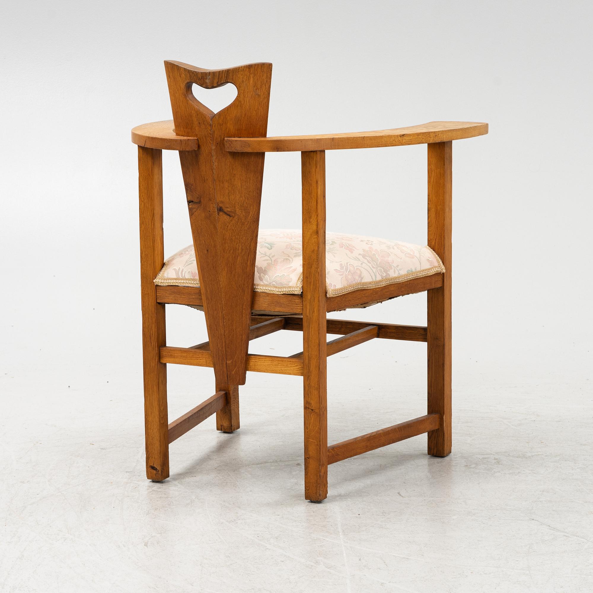 An oak Arts and Crafts armchair, early 20th century.