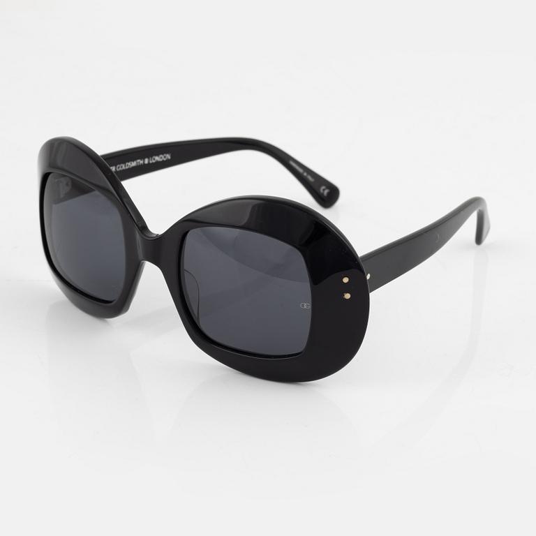 Oliver Goldsmith, a pair of black "Uuksu" sunglasses.