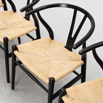 Hans J. Wegner, a set of four 'CH-24' chairs, Carl Hansen & Søn, Denmark.