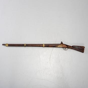 An early 19th century flintlock rifle.