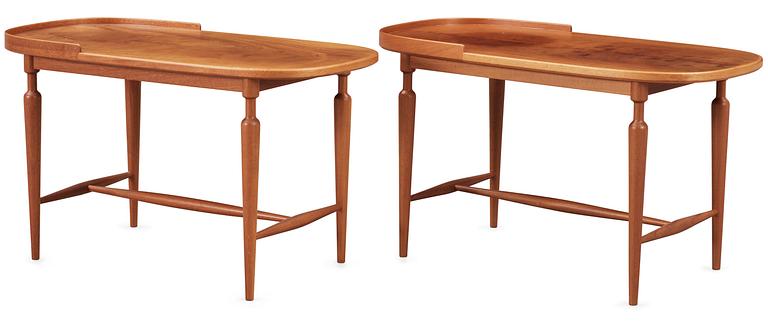 A pair of Josef Frank mahogany tables by Svenskt Tenn.