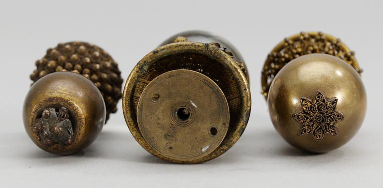 A set of three Mandarin knobs for hat.
