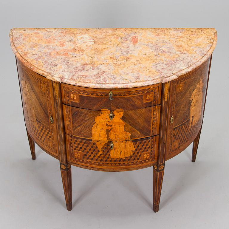 A Louis XVI style chest of drawers, France, second half of the 19th century.