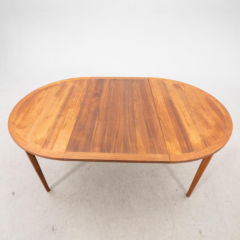 A 1960s walnut Linden dining table.