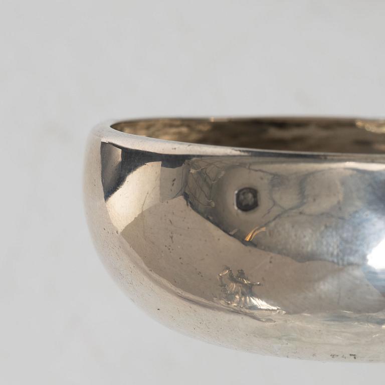 A French silver tastevin, mid-19th Century.