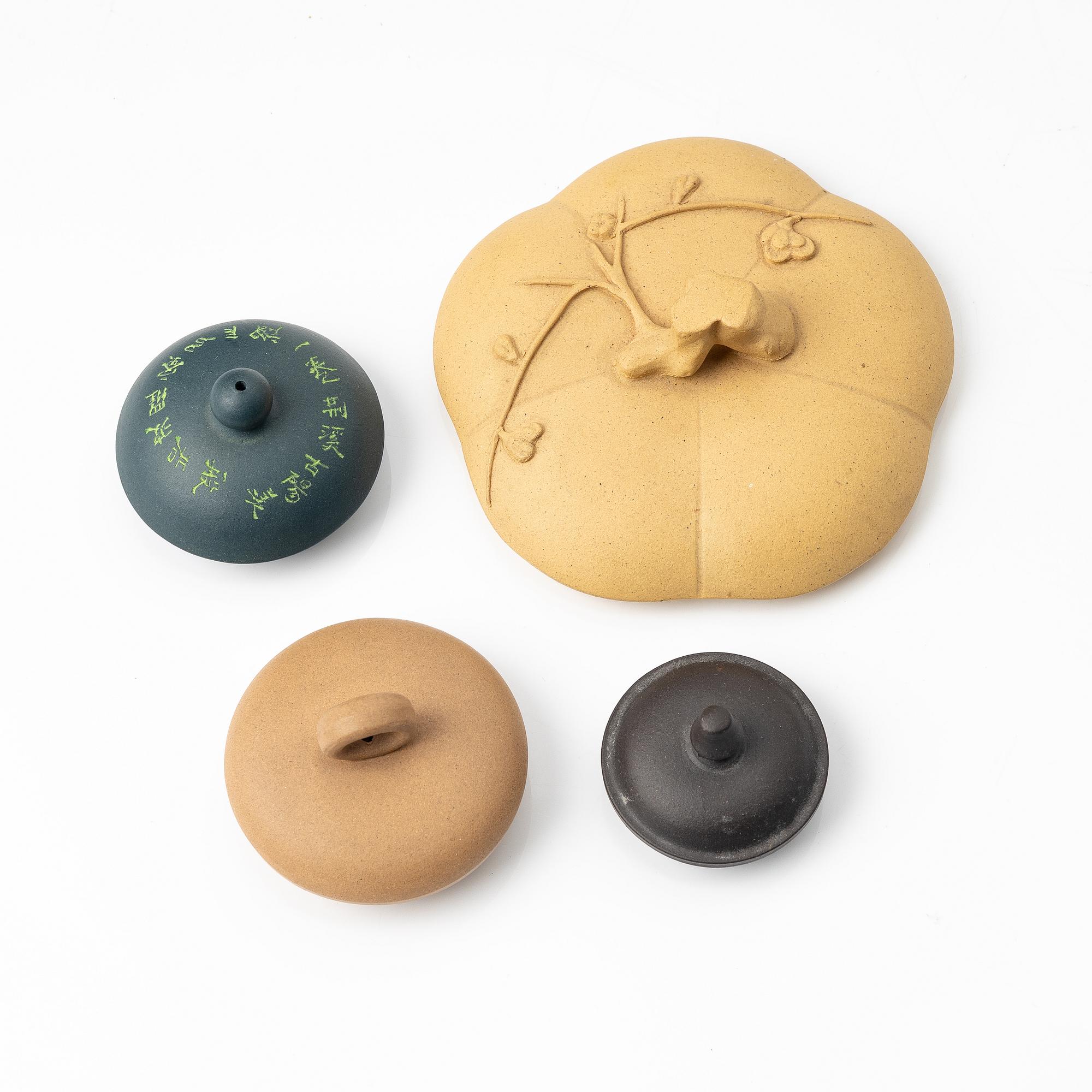 A group of three yixing teapots and a box with cover, China, 1970/80s.