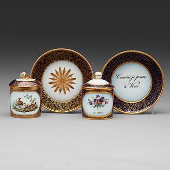 Two Berlin cups with covers and stands, circa 1800.