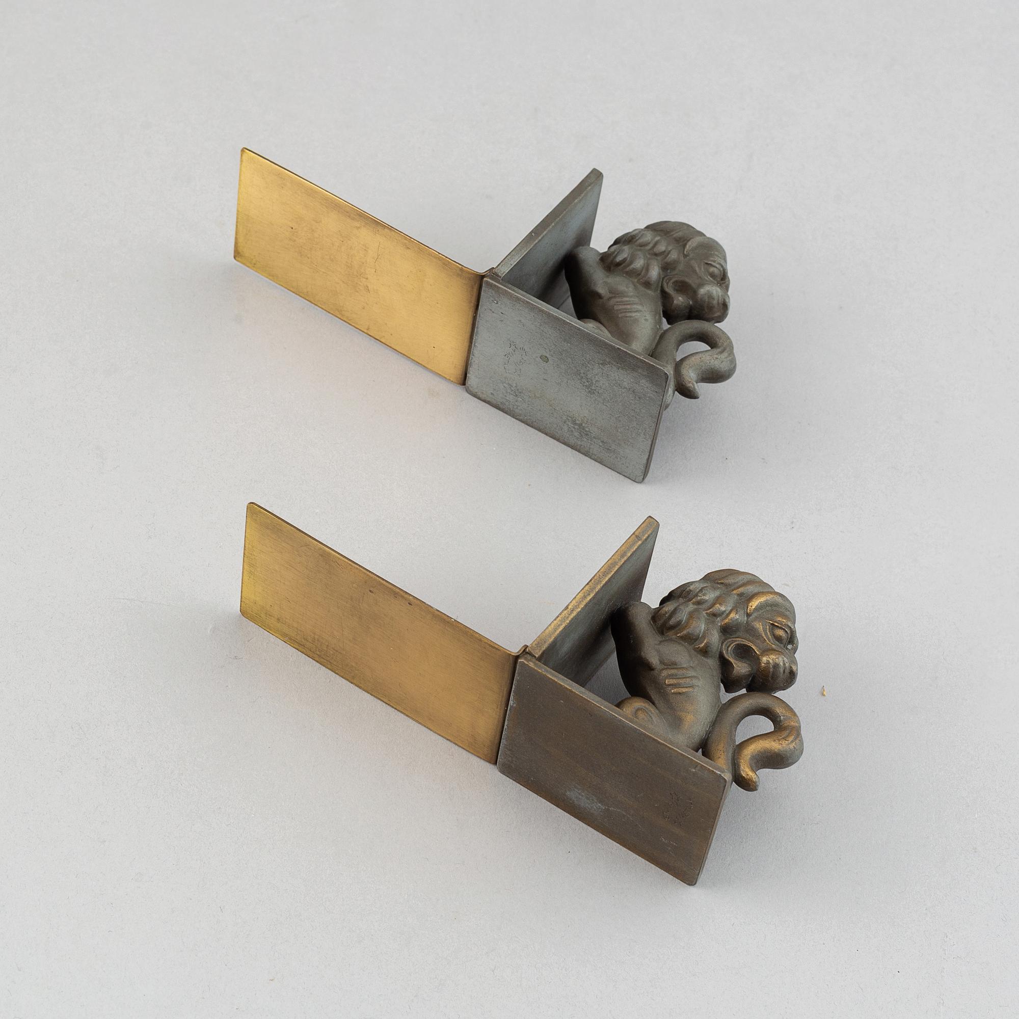 A pair of brass book ends, Stjärnmetall, 1930's.