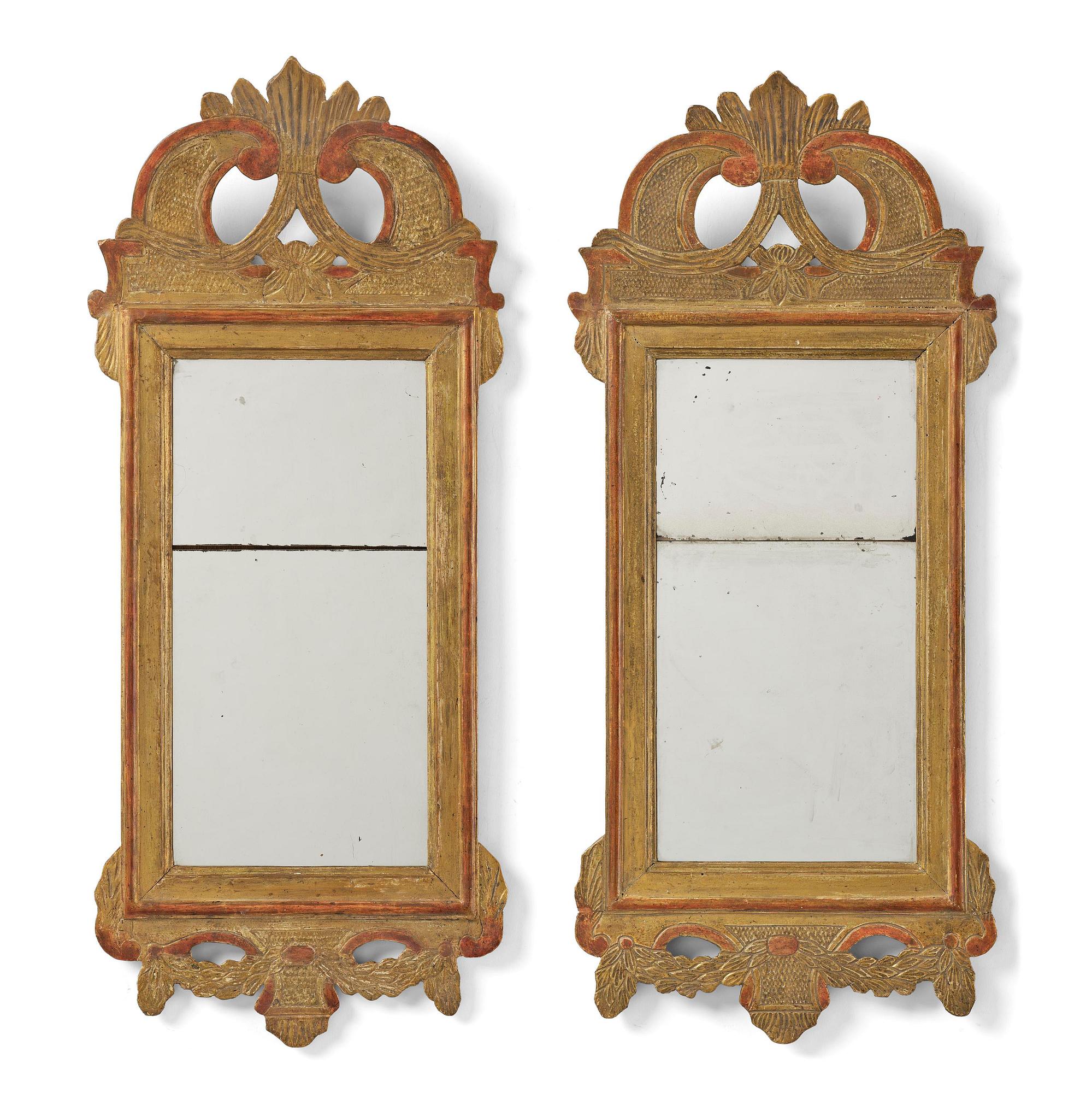 A pair of Gustavian giltwood mirrors by N. Falkengren (master in Jönköping 1776-1813).