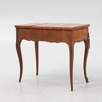 A Louis XV style dressing table, early 20th Century.