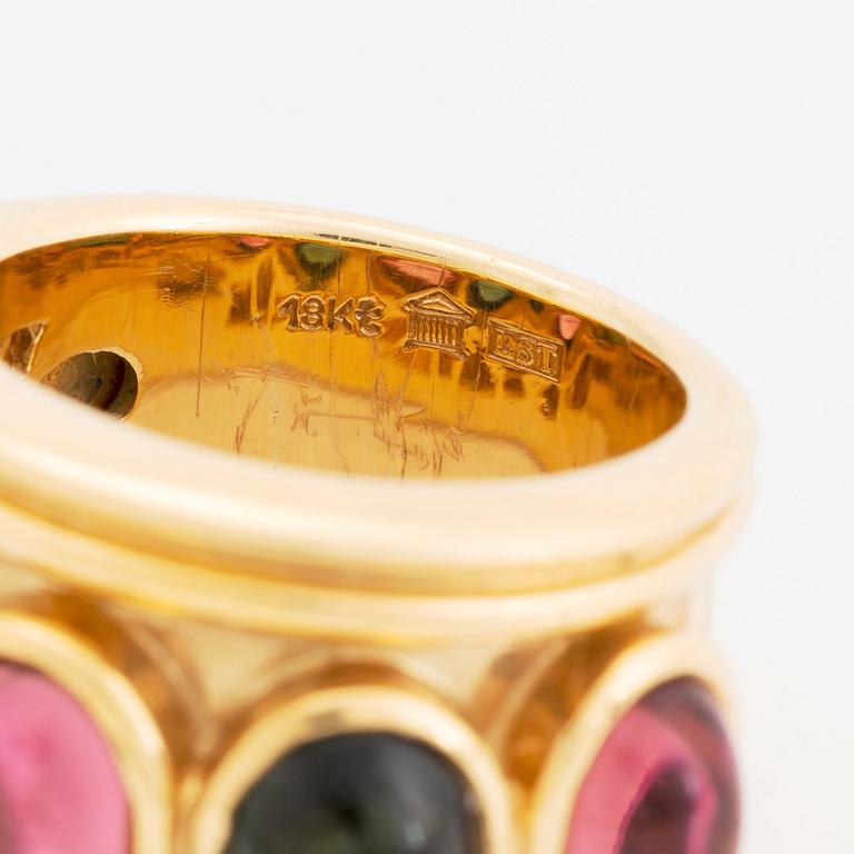 An 18K gold Temple St Clair ring set with cabochon-cut tourmalines.