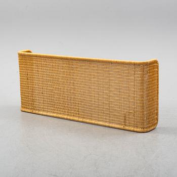 A late 20th century rattan bedside.