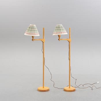 CARL MALMSTEN, a pair of birch 'Staken' standard lights.