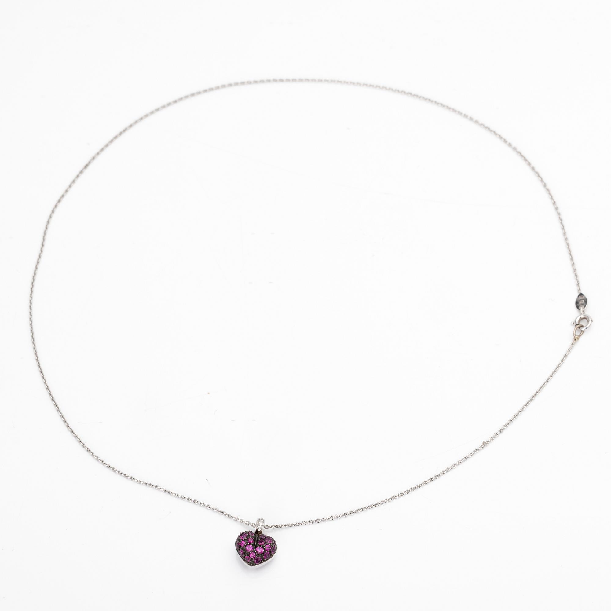 Necklace, 18K white gold, with a heart-shaped pendant in black rhodium-plated white gold set with rubies and brilliant-cut diamonds.