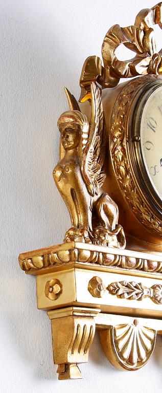 VÄGGPENDYL, empirestil, Ernst Lindberg, Stockholm.