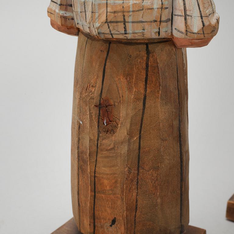 and CARL JOHAN TRYGG, three wooden sculptures, signed and dated, 1940s.