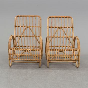 A pair of bamboo and rattan easy chairs, 1940's/50's.