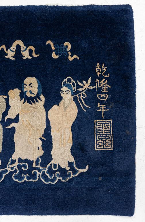 A Chinese 'immortals' carpet, Baotou, Measure: approx. 75 x 185 cm.