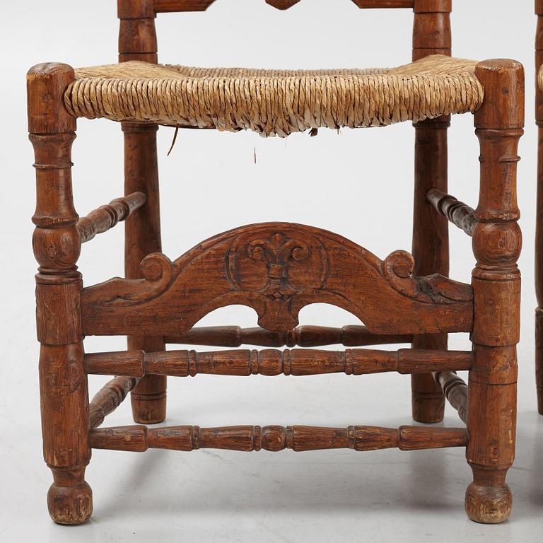 A pair of Spanish colonial style ladder-back chairs, circa 1900.