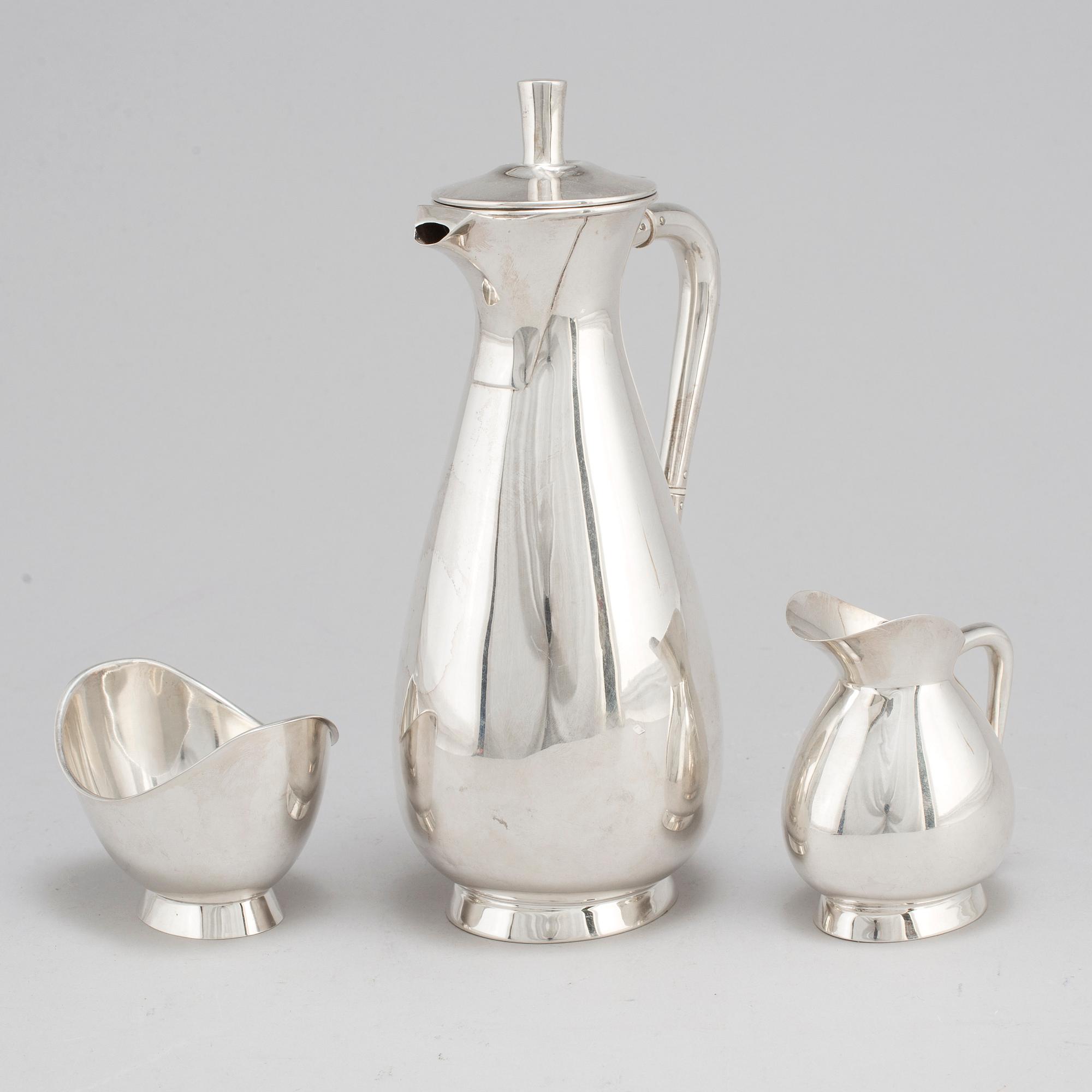 A three piece sterling silver coffee set, Germany. 20th century.