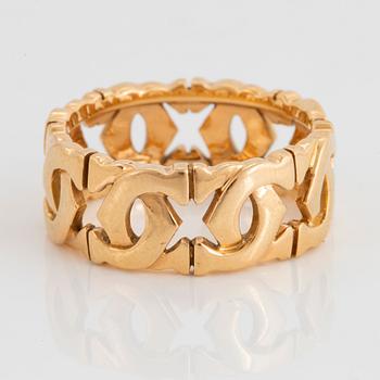 An 18K gold Cartier "Double C" ring.