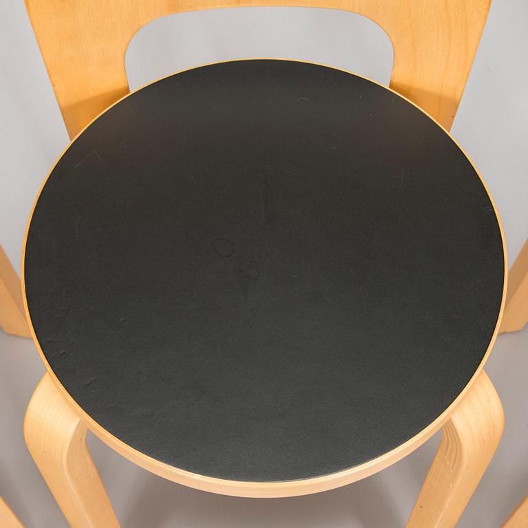 Alvar Aalto, a table and three chairs, Artek 2006 and 2007.