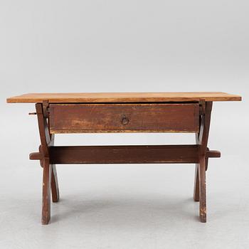 A Swedish folk-art trestle table from Dalarna, dated 1854.
