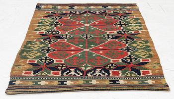 A carrige cushion, "Rosettes", flat weave, c. 88 x 58 cm, Skytts or Oxie district, southwestern Scania,.