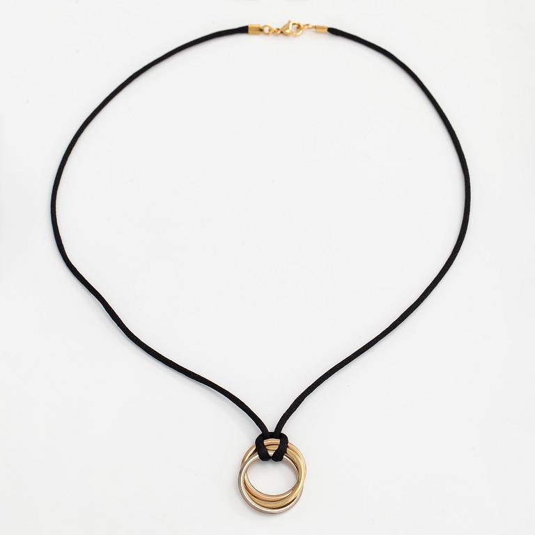 Cartier, necklace/pendant, "Trinity", 18K tricolour gold with black silk cord.