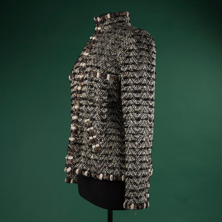 A jacket by CHANEL, in size 42(FR).