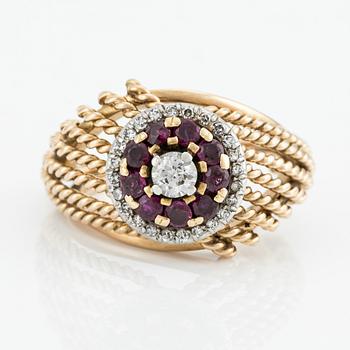 Ring, 18K gold with brilliant-cut diamonds and red stones, likely rubies.