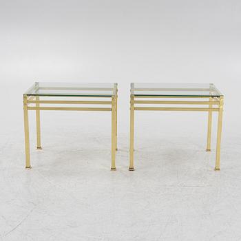 A pair of glass top bedside tables, second half of the 20th century.
